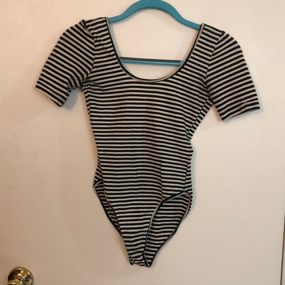Black and white drop back body suit
